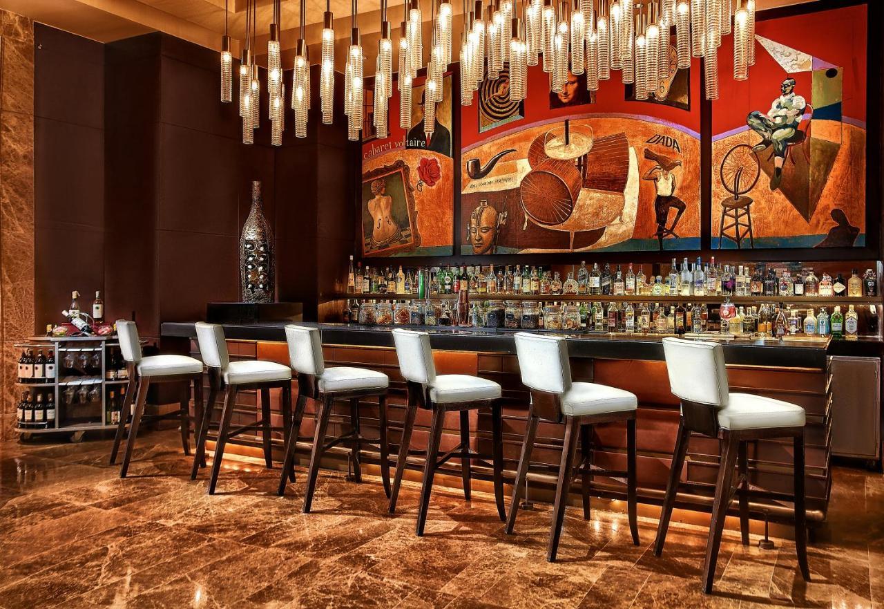 Crimson Hotel Filinvest City, Manila Muntinlupa City Exterior photo The bar at the lobby