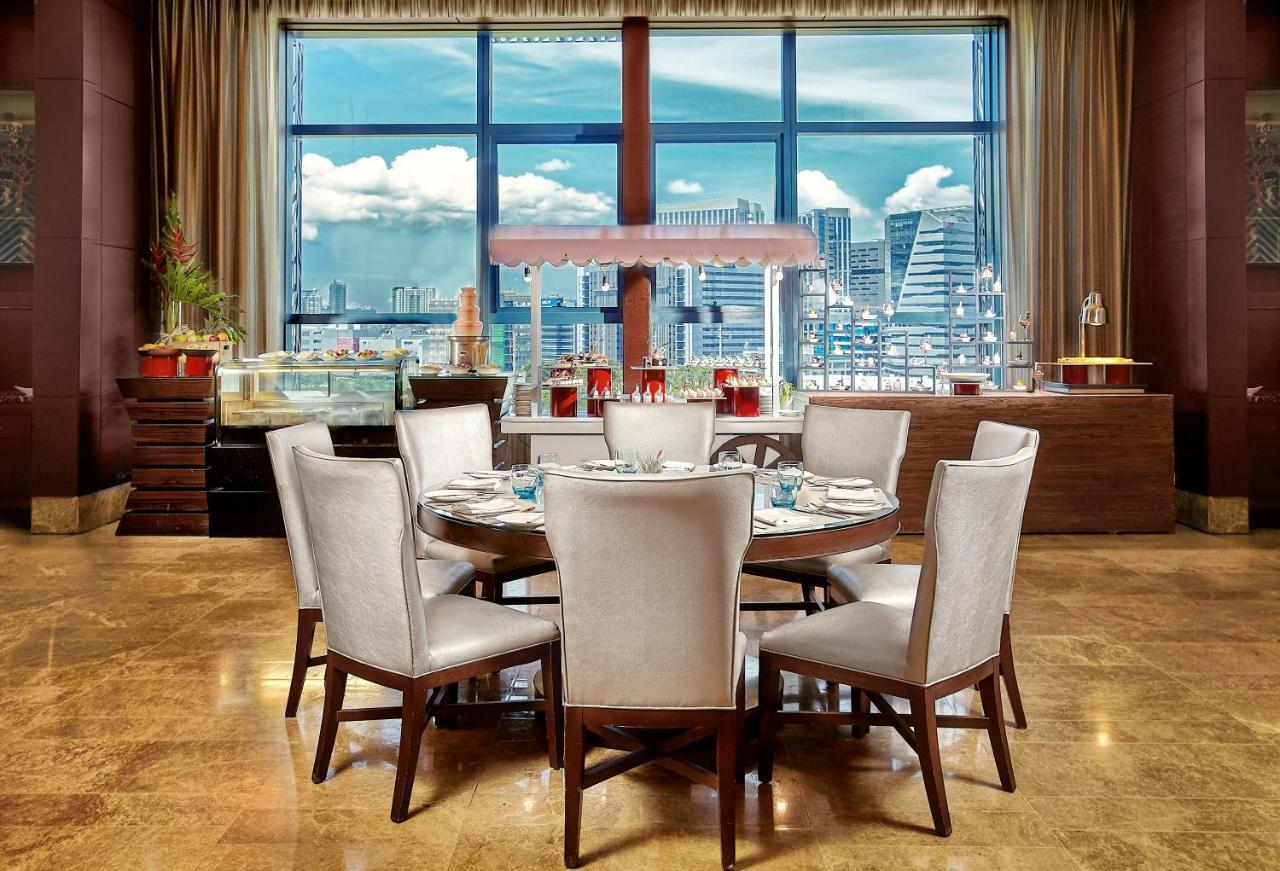Crimson Hotel Filinvest City, Manila Muntinlupa City Exterior photo The dining room