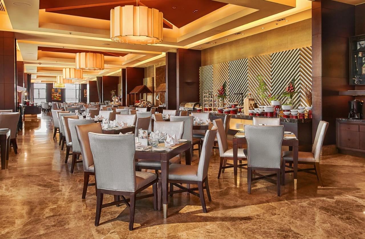 Crimson Hotel Filinvest City, Manila Muntinlupa City Exterior photo The restaurant